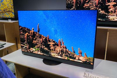 A hands-on photo of Panasonic’s new flagship OLED TV at CES 2025.